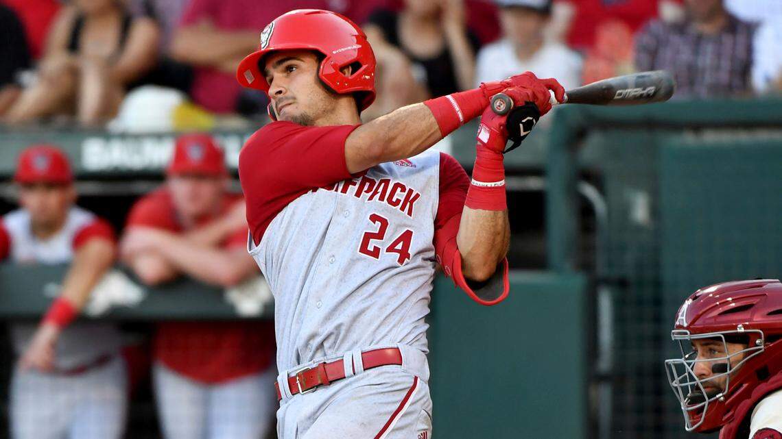 North Carolina State batter Luca Tresh (24) against Arkansas during an NCAA college baseball super regional game ) Sunday, June 13, 2021, in Fayetteville, Ark. (AP Photo/Michael Woods)