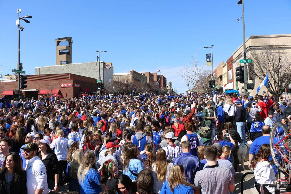 University of Kansas students and Jayhawk fans packed Massachusetts Street in downtown Lawrence to celebrate after the KU men’s basketball team earned a spot in the Final Four by defeating the University of Miami.