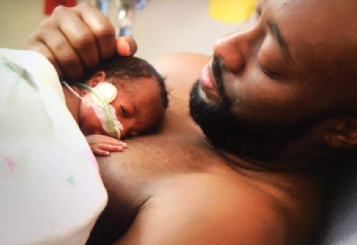 Jevon McBride with his daughter, Juliana, who was born prematurely after her parents were involved in a head-on collision near their home in Warrensburg, Missouri. McBride was stationed at Whiteman Air Force Base in Knob Noster, Missouri. 