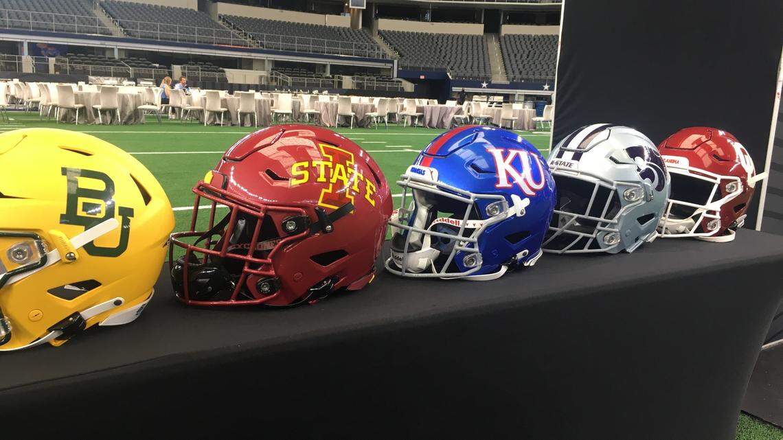 Several football helmets were on display at the 2021 Big 12 football media days in Arlington, Texas. Oklahoma and Texas announced the first step toward leaving the conference a few days later.
