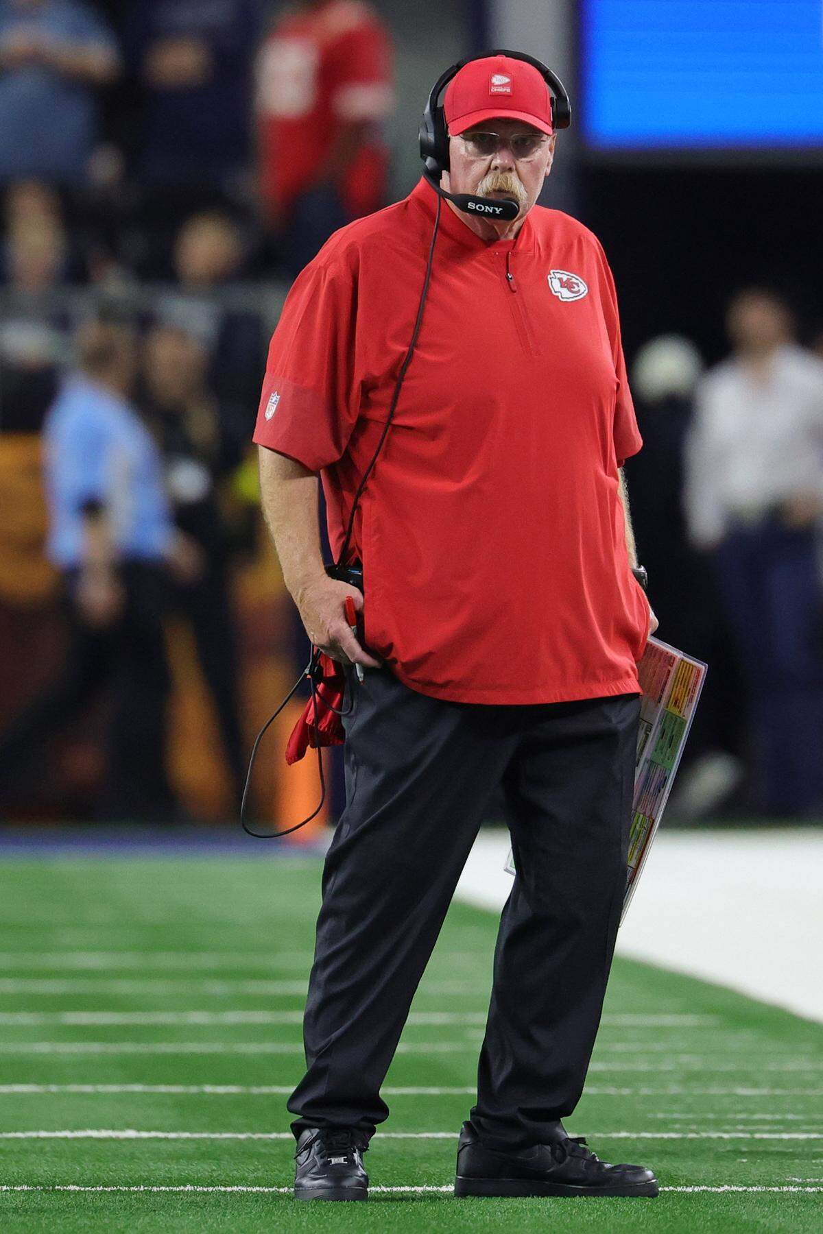 Chiefs head coach Andy Reid mulls his next move as his Kansas City team plays an NFL Week 13 game against the Dallas Cowboys at AT&T Stadium in Arlington, Texas on Thanksgiving Day, Thursday, Nov. 27, 2025.