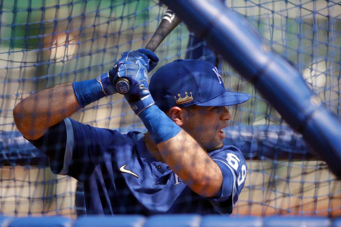 Kansas City Royals’ Sebastian Rivero bats during baseball practice at Kauffman Stadium, Monday, July 6, 2020, in Kansas City, Mo. (AP Photo/Charlie Riedel)