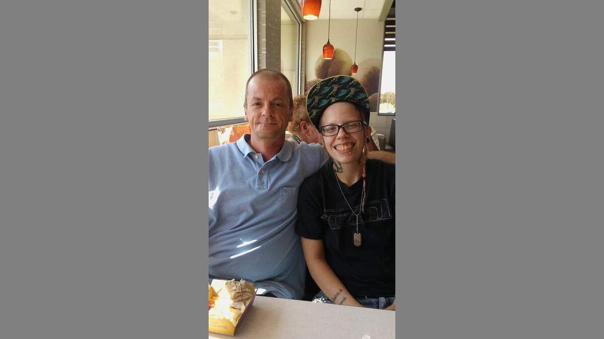 Ernest McConville, who died during a fire in Clinton, Missouri, can be seen with Michaela Starr, one of his seven children. 