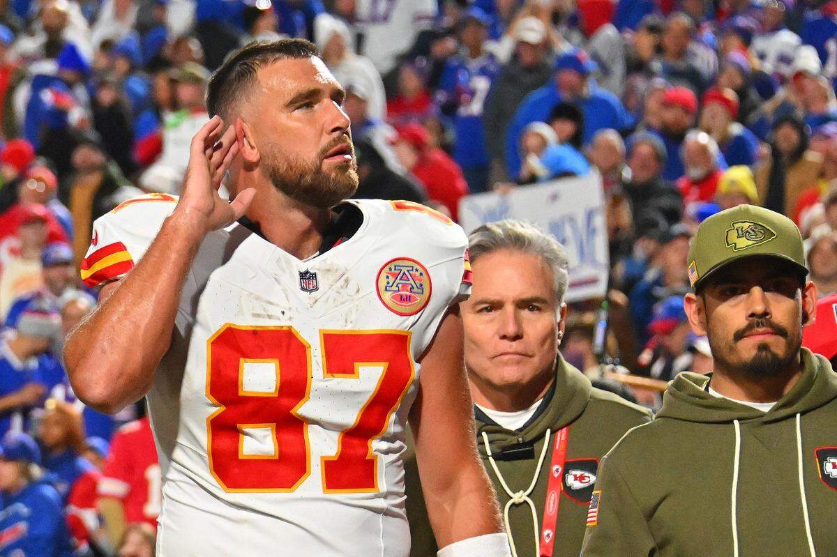 Kansas City Chiefs tight end Travis Kelce gestures to the Buffalo Bills crowd as he walks off the field near halftime of an NFL Week 9 game at Highmark Stadium in Orchard Park, New York, on Sunday, Nov. 2, 2025.