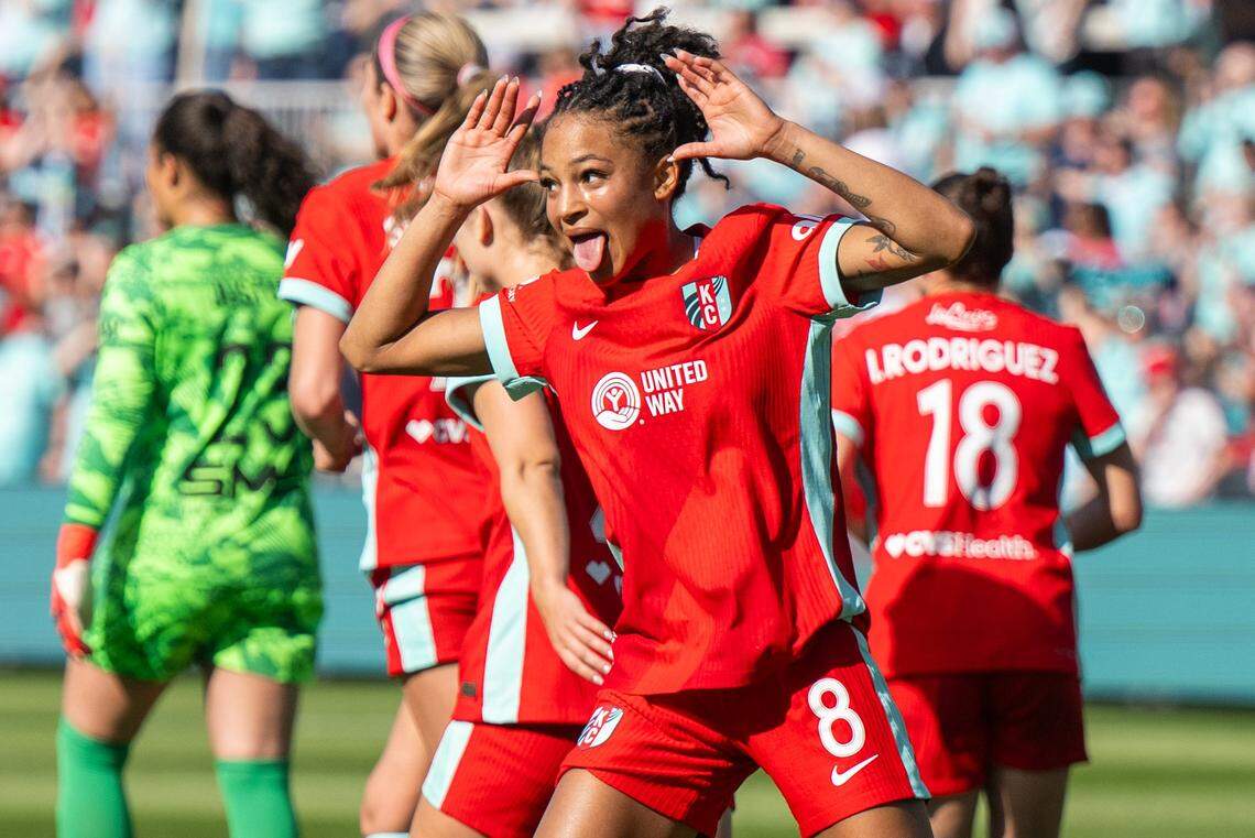 Kansas City Current players celebrate after a goal by Kansas City Current midfielder Croix Bethune (8) in the second half of the Current's match vs. the Utah Royals, on Saturday, March 14, 2026, at the CPKC Stadium. The Current won 2-1 against the Utah Royals.