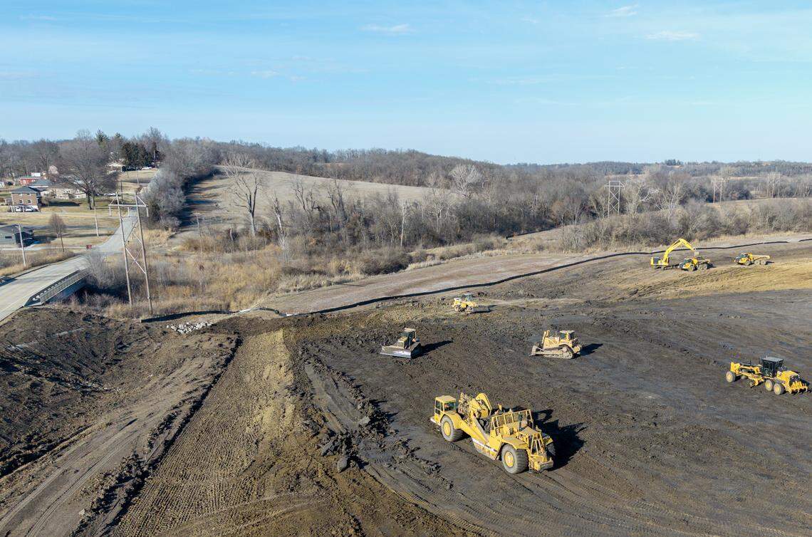 Houses along Bly Road can be seen as heavy equipment works on the site of a proposed supersize data center on Bly Road in eastern Independence on Friday, Feb. 13, 2026. Nearby residents oppose the planned 400-acre, $6.6 billion AI facility.