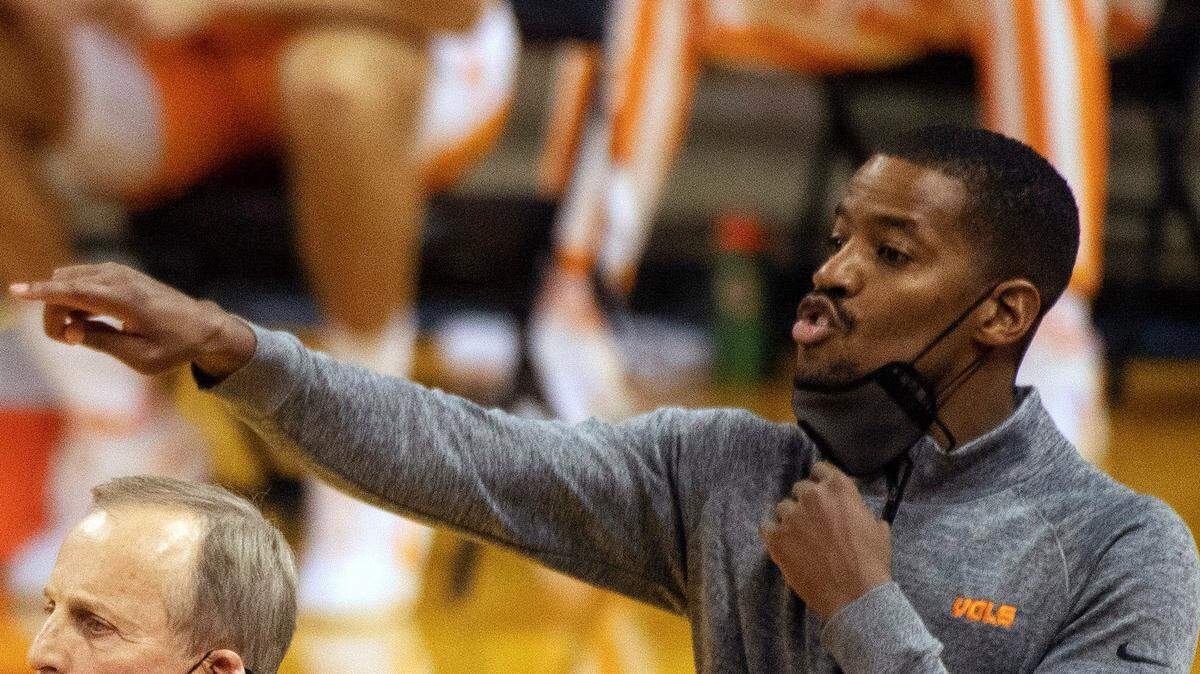 FILE - Tennessee head coach Rick Barnes, left, and assistant coach Kim English, right, position their players during the first half of an NCAA college basketball game against Missouri in Columbia, Mo., in this Wednesday, Dec. 30, 2020, file photo. Former NBA player and college assistant Kim English was hired to coach George Mason’s men’s basketball team Tuesday, March 23, 2021, exactly a week after the school fired Dave Paulsen.(AP Photo/L.G. Patterson, File)