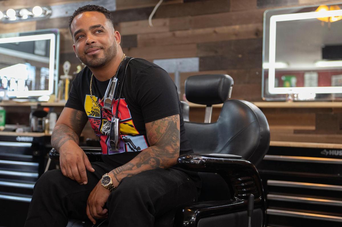 Draque Murff has owned Draque’s Barbershop in midtown for the past 11 years.