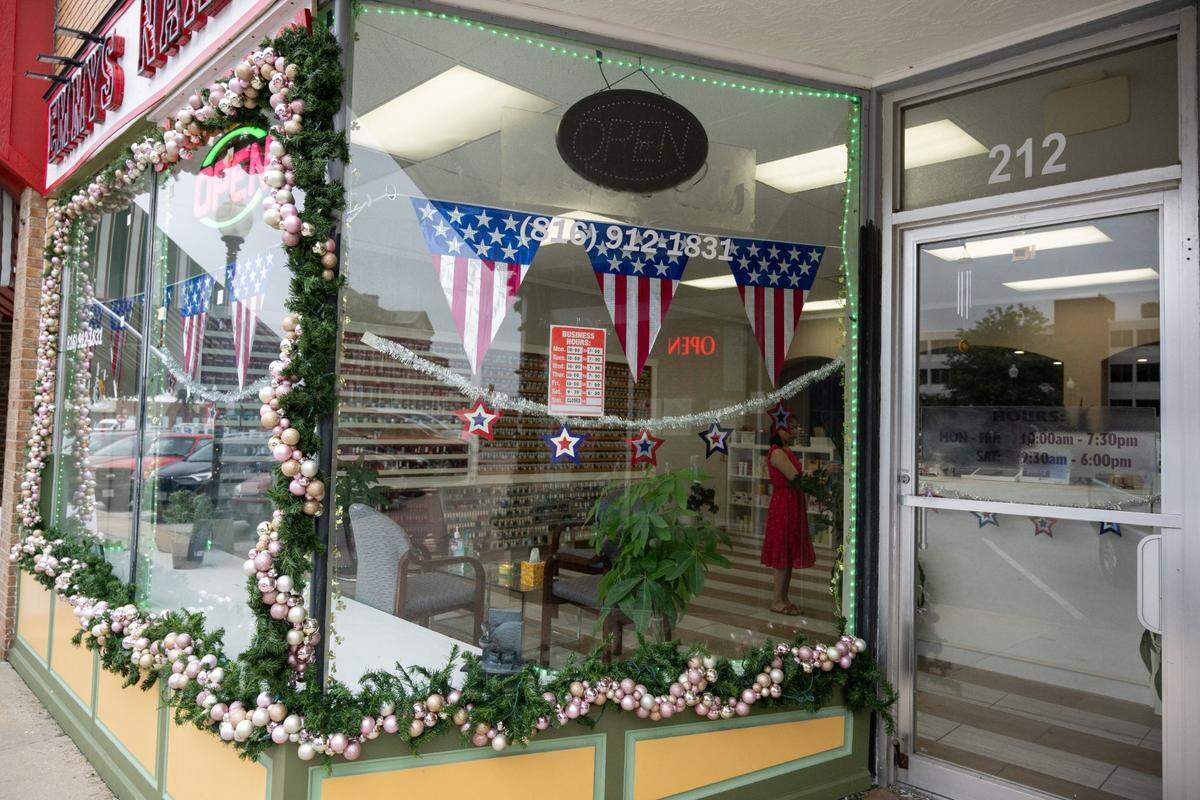 Emmy’s Nails in Independence was decorated with Christmas and Independence Day decorations on Wednesday. The suburb usually celebrates Christmas in July this time of year, which happens to be coinciding with the Hallmark movie filming.