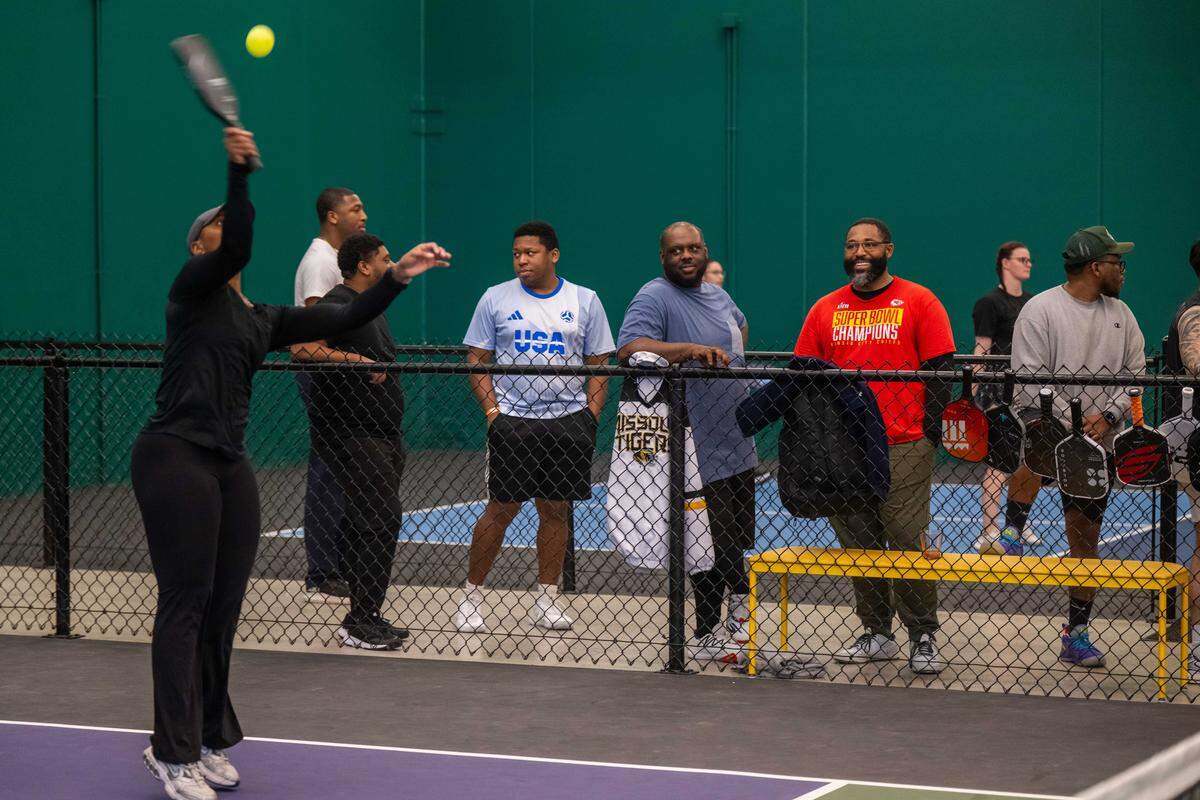 Imani Simmons returns a volley during a match at a meeting of the Black Pickleball Club at SW19 at the Stadium, on Sunday, Feb. 22, in Kansas City. 
