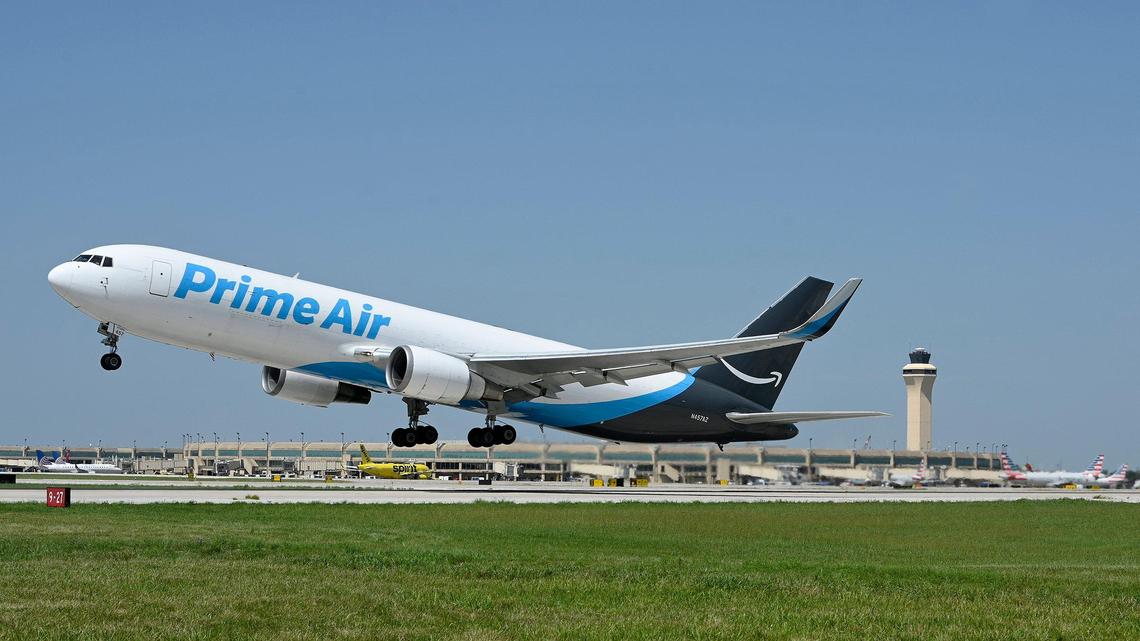 An Amazon Prime Air cargo flight takes off from Kansas City International Airport Thursday, Aug. 26, 2021.