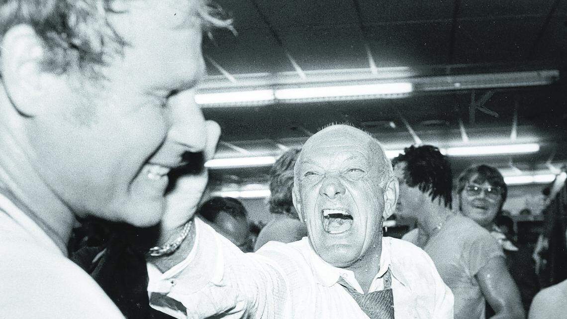 September 27 1978 Ecstatic Ewing Kauffman, owner of the Royals, jumped into the frivolity of the locker room after his team clinched its third straight American League West Division title Tuesday night. Here, Kauffman gives pitcher Marty Pattin a friendly slap for a dousing received moments earlier. Edward J Hille/ Kansas City Star staff
