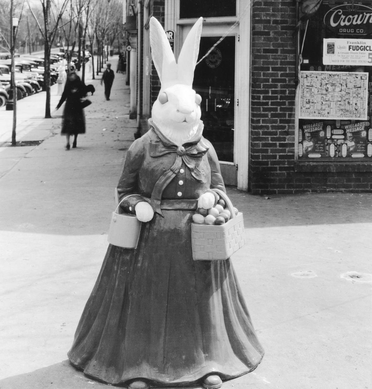 One of the Easter bunnies stood outside of Crown Drug Store in the Crestwood Shops in 1922. The bunnies were originally constructed of plaster of Paris, chicken wire and horse hair. The original sculptures are now protected with a fiberglass coating.