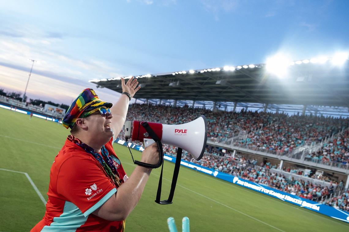 Brooke Fowler leads KC Current fans in a chant during the second half of a match against the Chicago Red Stars on Friday, June 14, 2024, at CPKC Stadium in Kansas City.