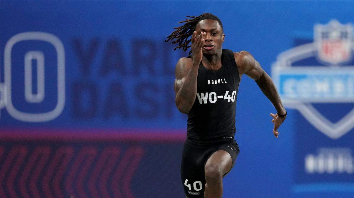 Texas wide receiver Xavier Worthy (WO40) ran an official time of 4.21 seconds to set a combine record during the 2024 NFL Combine at Lucas Oil Stadium.