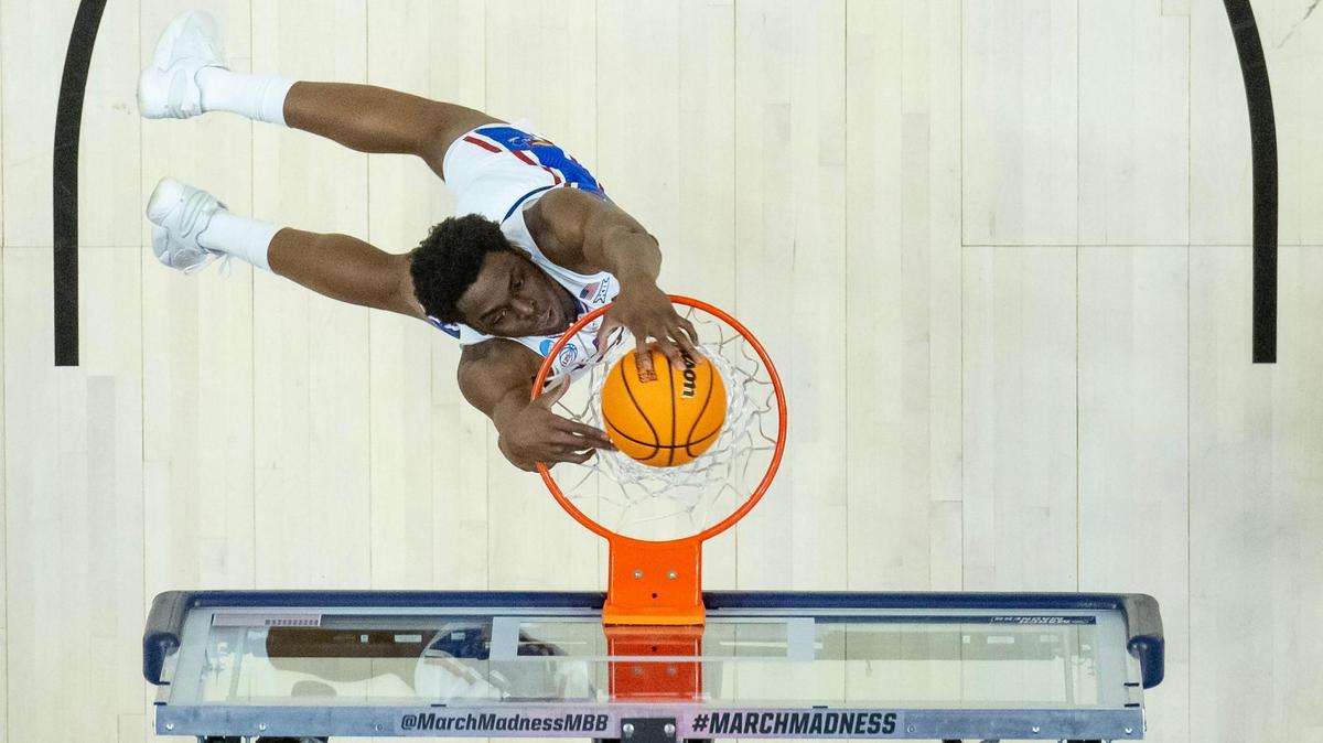 Kansas center Ernest Udeh Jr. (23) dunks the ball against Howard during a first-round college basketball game in the NCAA Tournament Thursday, March 16, 2023, in Des Moines, Iowa.