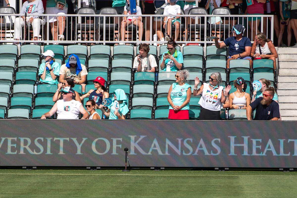 Fans during the weather delay before the match between the Kansas City Current and Orlando Pride at CPKC Stadium on Aug. 16, 2025.