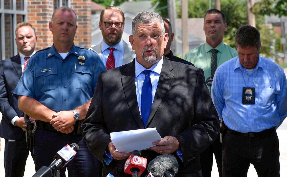 Clay County Prosecutor, Dan White, front, announced charges against Joshua T. Rocha, 24, Wednesday with one count each of first-degree murder and armed criminal action in the killing of North Kansas City Police officer Daniel Vasquez, who was fatally shot during a traffic stop late Tuesday morning. Rocha was being held on a $2 million bond in the Clay County jail and is scheduled to make his first appearance in court at 1:30 p.m. Thursday.