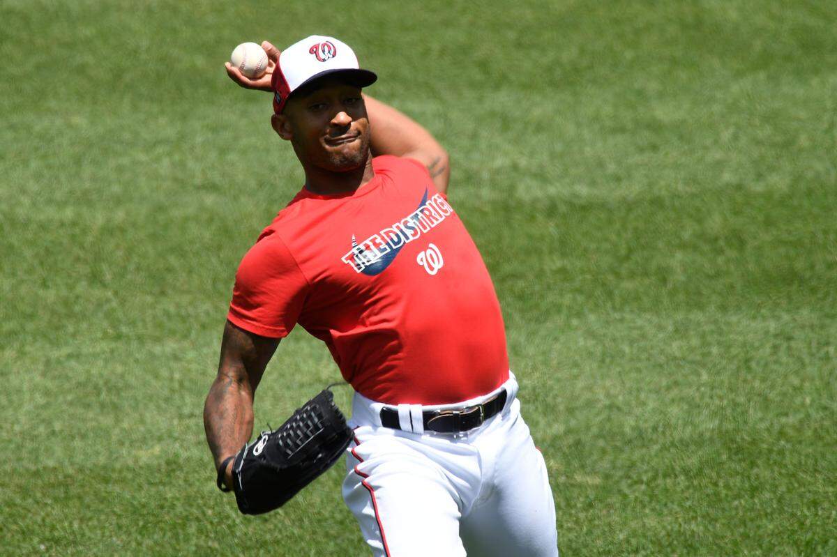 Washington Nationals pitcher Sam Freeman throws during a baseball training camp workout at Nationals Park in Washington, Thursday, July 9, 2020. (AP Photo/Susan Walsh)