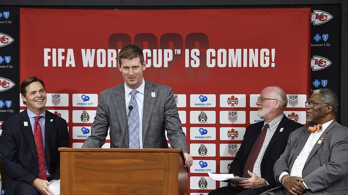 Sporting Kansas City president Jake Reid speaks during a press conference at Arrowhead Wednesday, with Kansas City Chiefs President Mark Donovan (from left), Kansas City, Kan., Mayor David Alvey and Kansas City Mayor Sly James.