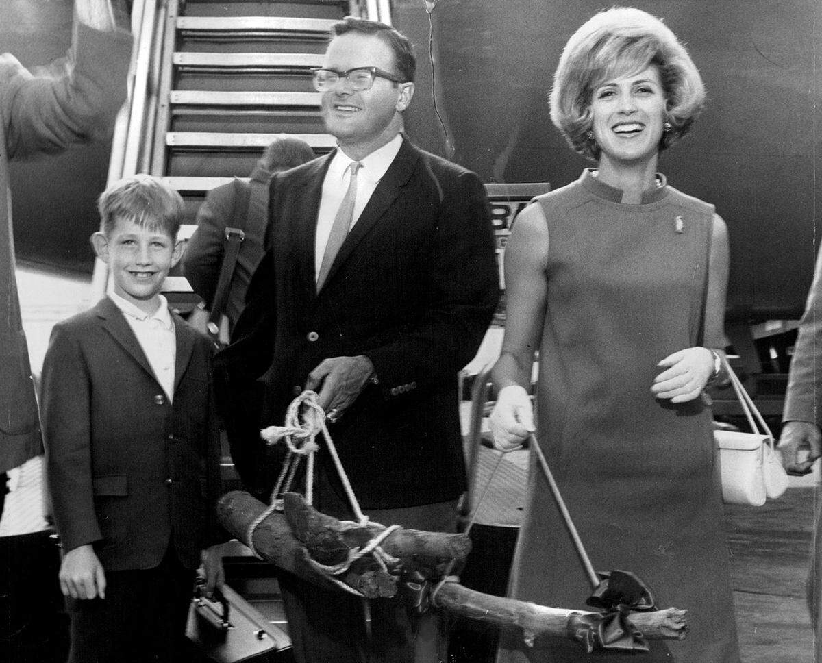 Chiefs owner Lamar Hunt arrived at the downtown airport with his wife, Norma, to attend a rally in 1967. At the left is Nat Milgram, son of Lester Milgram.