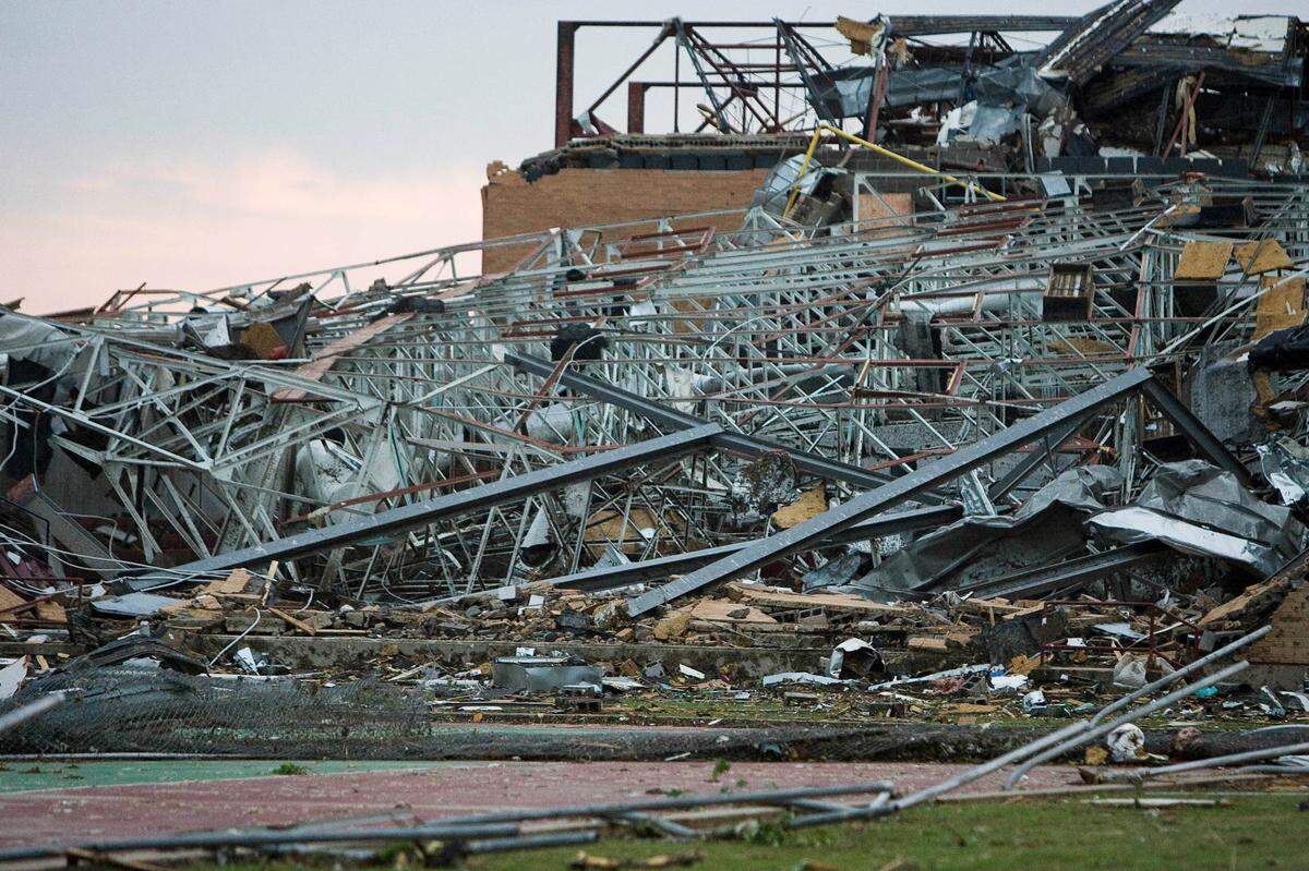 Joplin High School was reduced to a pile of twisted steel on Monday, May 23, 2011, after a tornado cut a half-mile wide and six-mile long swath through the heart of the city on Sunday in Joplin, Missouri.