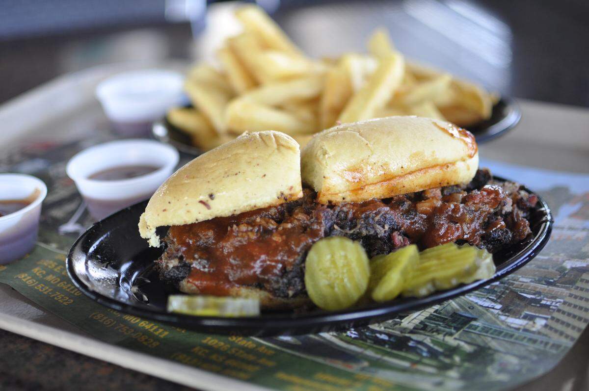 Gates Bar-B-Q’s burnt end sandwich with fries.