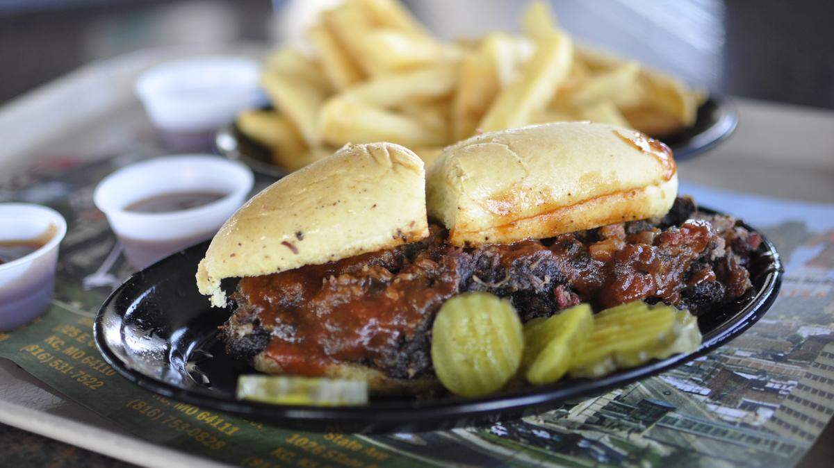 Gates Bar-B-Q’s burnt end sandwich with fries.