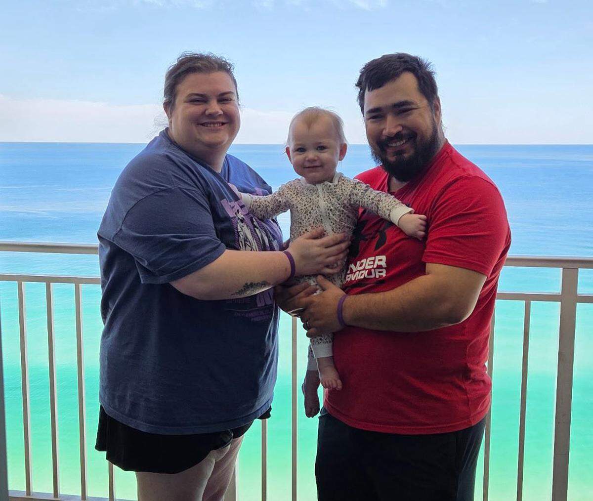 Skylar Biggs Jones with her husband, Dakota Jones, and their 14-month-old daughter, Brinnley, on vacation in Florida. 