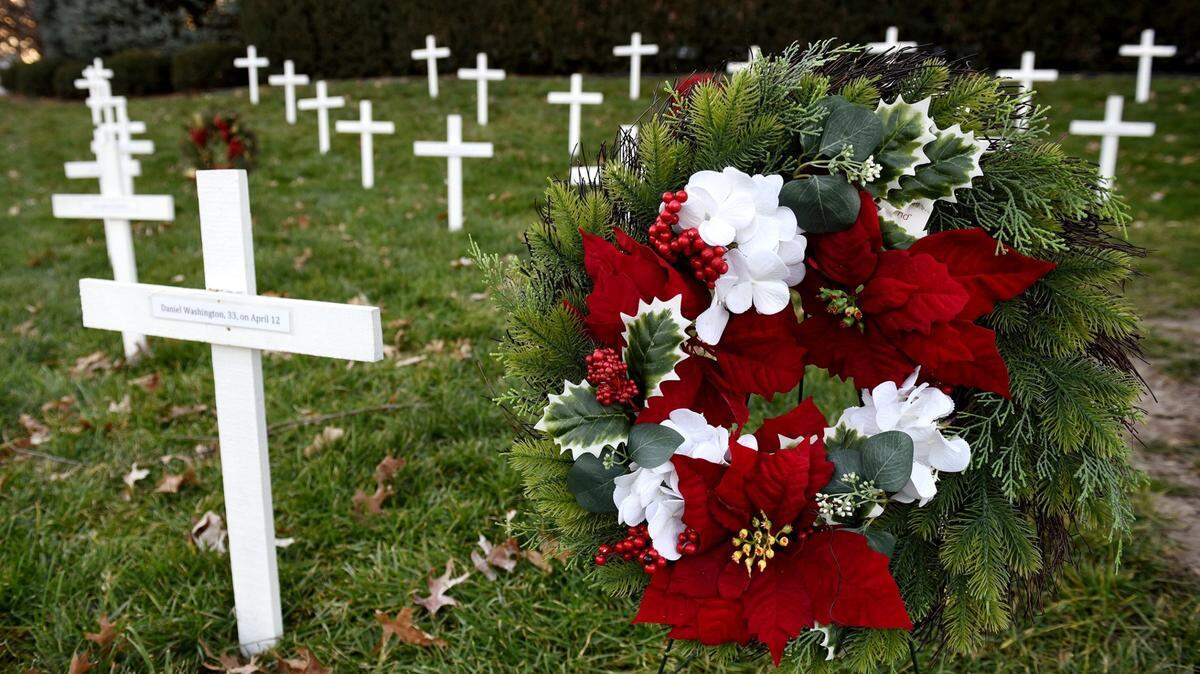 Crosses honoring homicide victims in Kansas City decorate the lawn outside the Wornall Road Baptist in Brookside on December 14, 2021, during the Longest Night, an event held around the first day of winter to remember the victims of homicides.