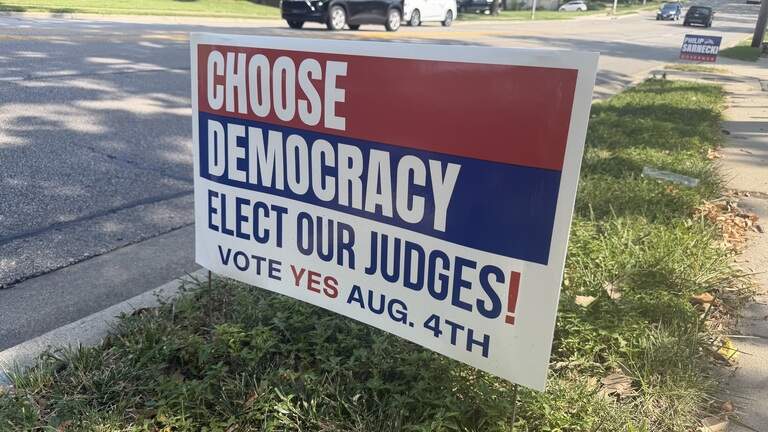 In Kansas, GOP pushes pro-democracy election message. In Missouri, the opposite