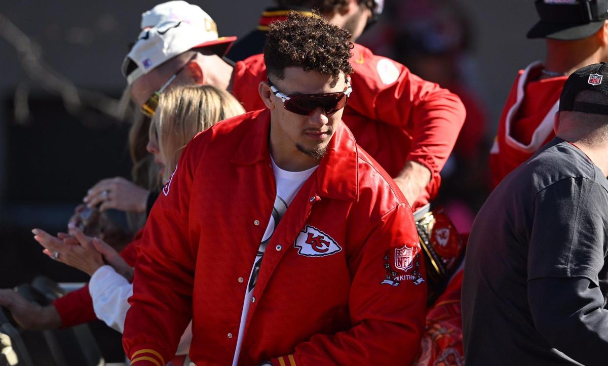 Kansas City Chiefs quarterback Patrick Mahomes rides a bus during the Super Bowl LVIII victory parade Wednesday.