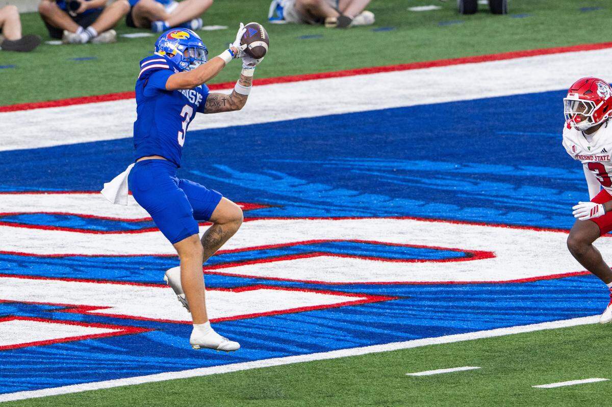 Kansas Jayhawks wide receiver Keaton Kubecka (3) hauls in a touchdown in the second half of the Jayhawks game vs. the Fresno State Bulldogs on Saturday, Aug. 23, 2025, at David Booth Kansas Memorial Stadium, in Lawrence.