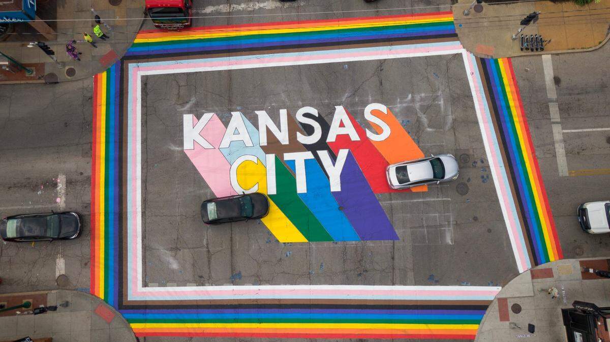 “Crosswalks to Pride,” a rainbow crosswalk with the words “Kansas City” emblazoned across the intersection of Broadway Boulevard and Westport Road, is shown on Tuesday, June 6,  2023.