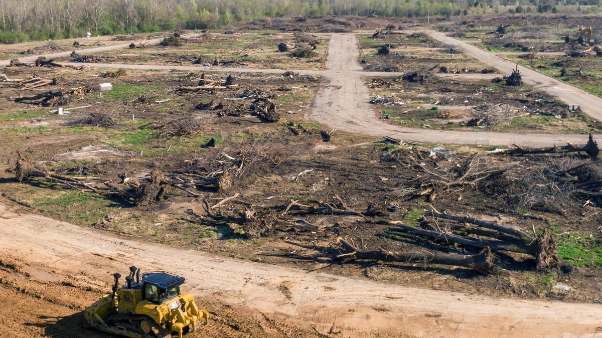 Heavy equipment worked Wednesday on the site of a new Jackson County Detention Center at 7000 E. U.S. 40 in Kansas City. The project is on hold as officials debate the facility’s cost and size.