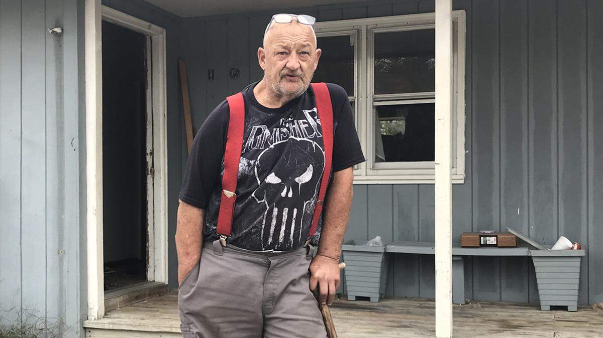 Harry Trostle, a 66-year-old disabled veteran, has been staying in an abandoned motel in Adrian, Missouri, for about six months.