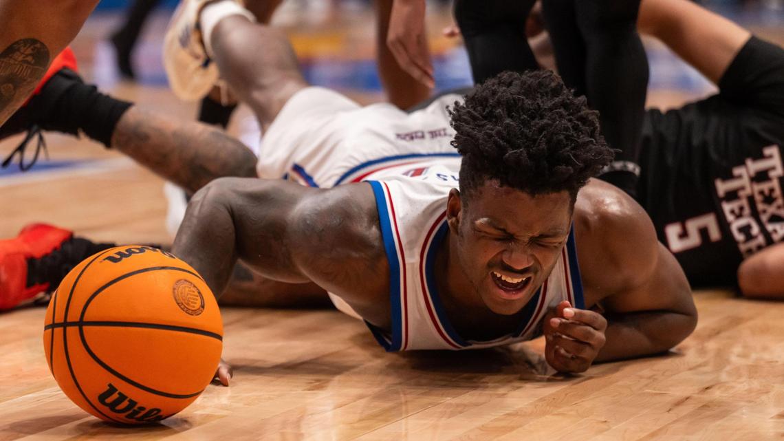 Kansas Jayhawks forward KJ Adams grimaces after taking a hard fall in the second half of the game vs. the Texas Tech Red Raiders on Saturday, Mar. 1, 2025, at Allen Fieldhouse.