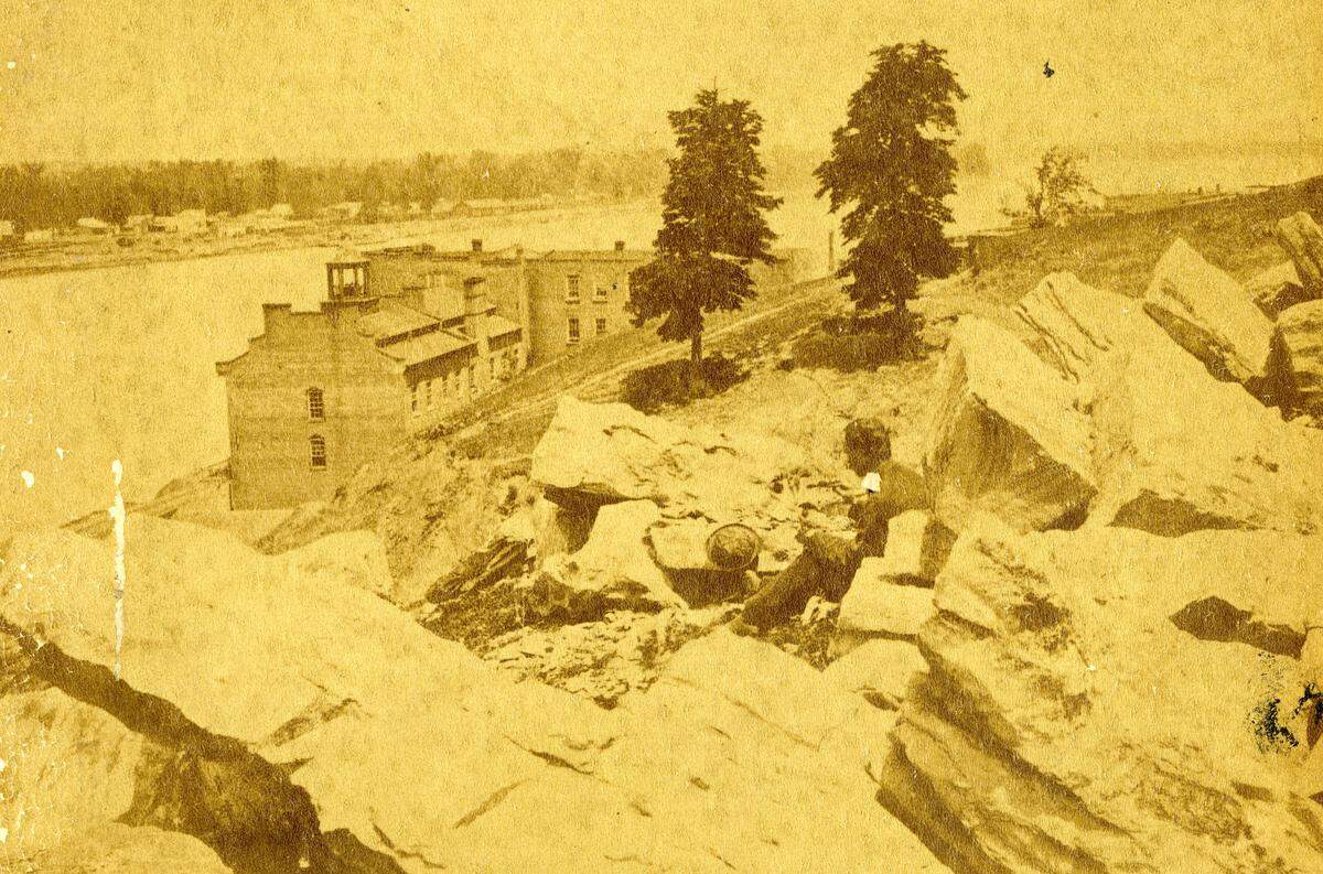 A view from 2nd Wyandotte Streets in Kansas City looks north across the Missouri River to Harlem on the north bank.