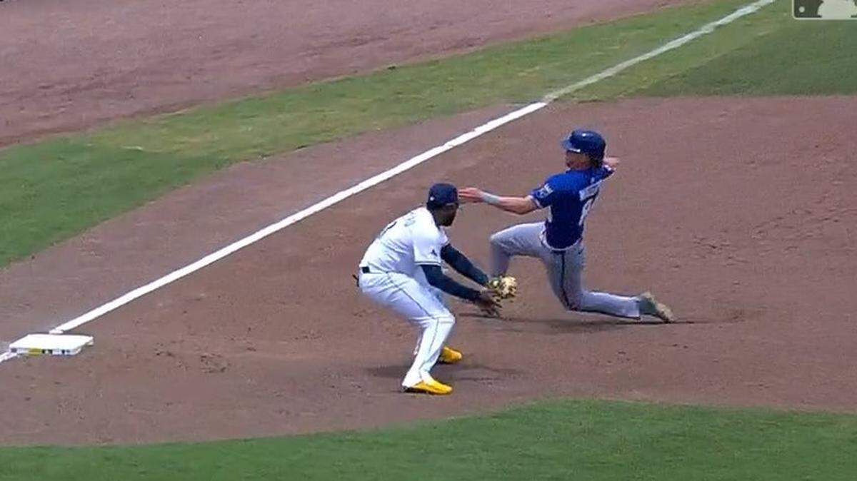 Drew Waters is about to be called safe. Then out.