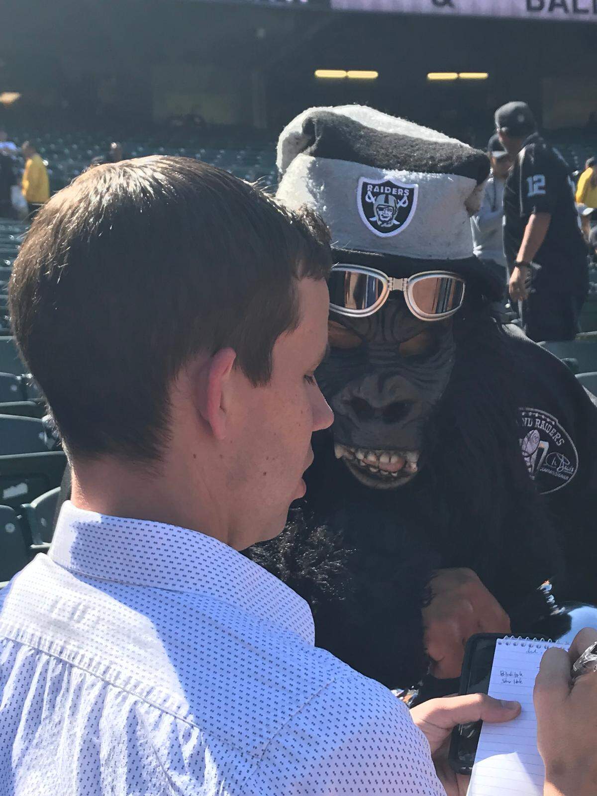 KC Star colleague Sam McDowell works the scene during the Chiefs’ final game in Oakland in 2019.