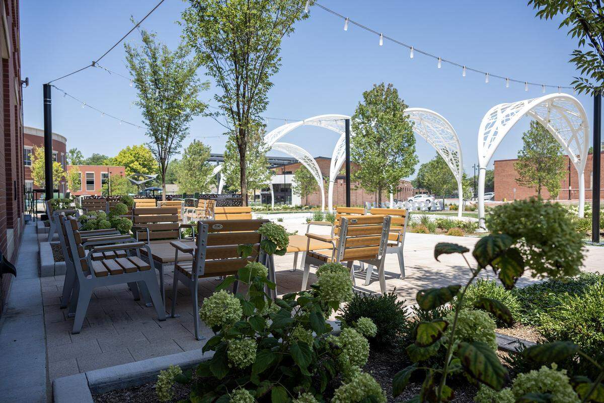 A view of the landscaping and structural arches at the Green Street development is seen from a nearby seating area on Tuesday, Aug. 5, 2025, in Lee's Summit.