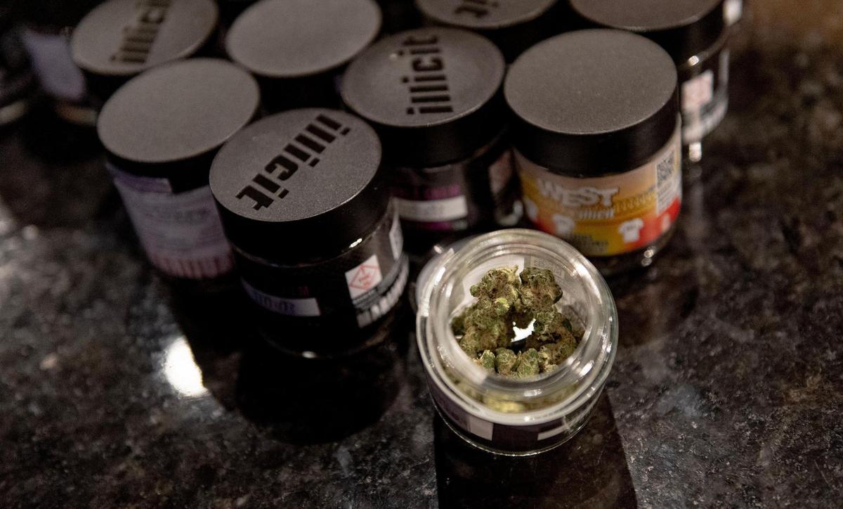 A jar containing 3.5 grams of marijuana flower is seen at Fresh Green Dispensary on Friday, Feb. 3, 2023, in Kansas City.