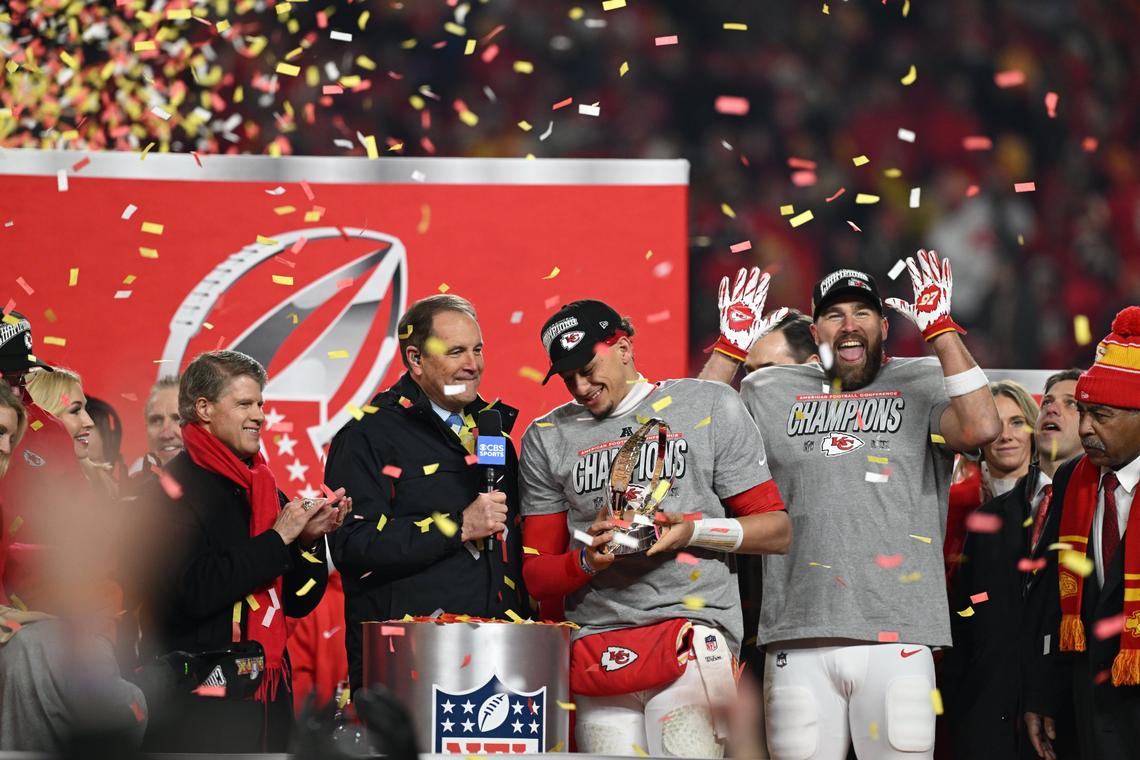 Kansas City Chiefs quarterback Patrick Mahomes, with Lamar Hunt trophy, and tight end Travis Kelce celebrate after winning the AFC Championship Game on Sunday, Jan. 26, 2025, at GEHA Field at Arrowhead Stadium.
