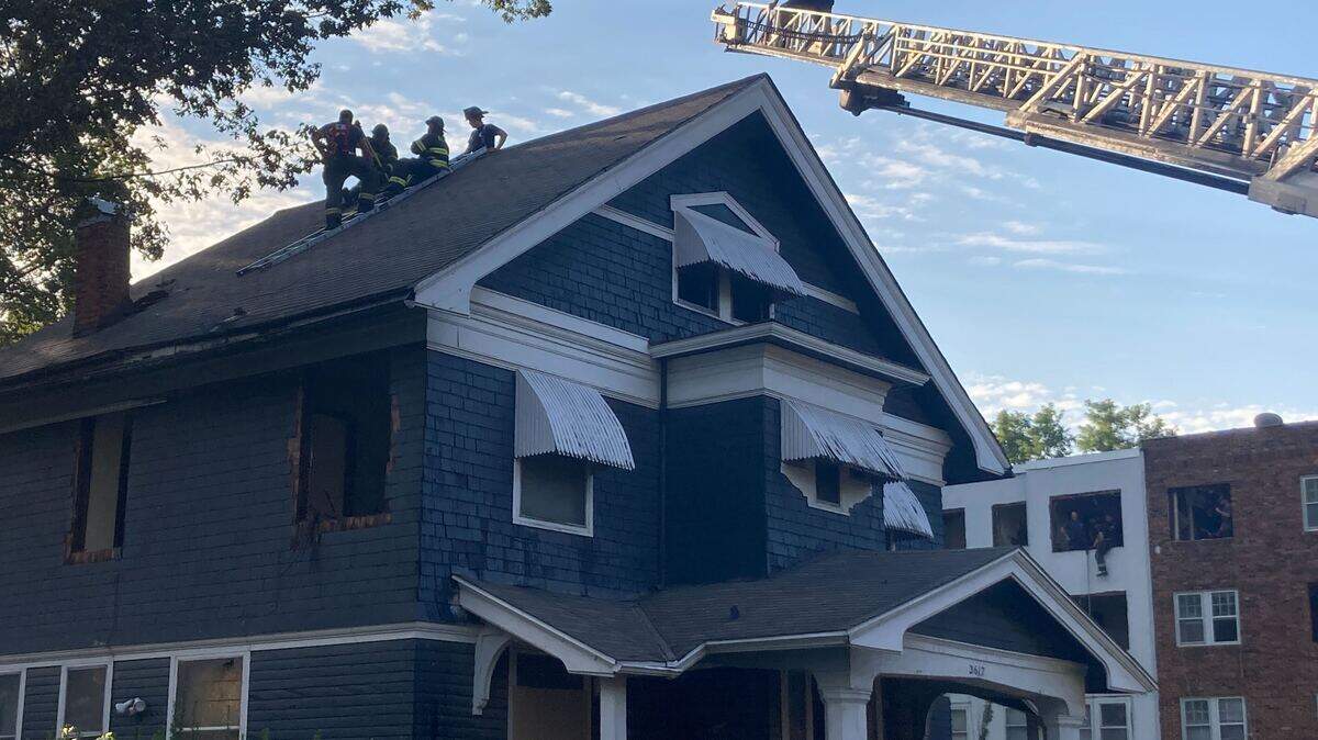 Kansas City fire crews train on a building off Southwest Trafficway on Oct. 2, 2025. Kansas City Life Insurance offered the fire department the chance to train on buildings it owns in the Valentine neighborhood as the company looks to demolish them.