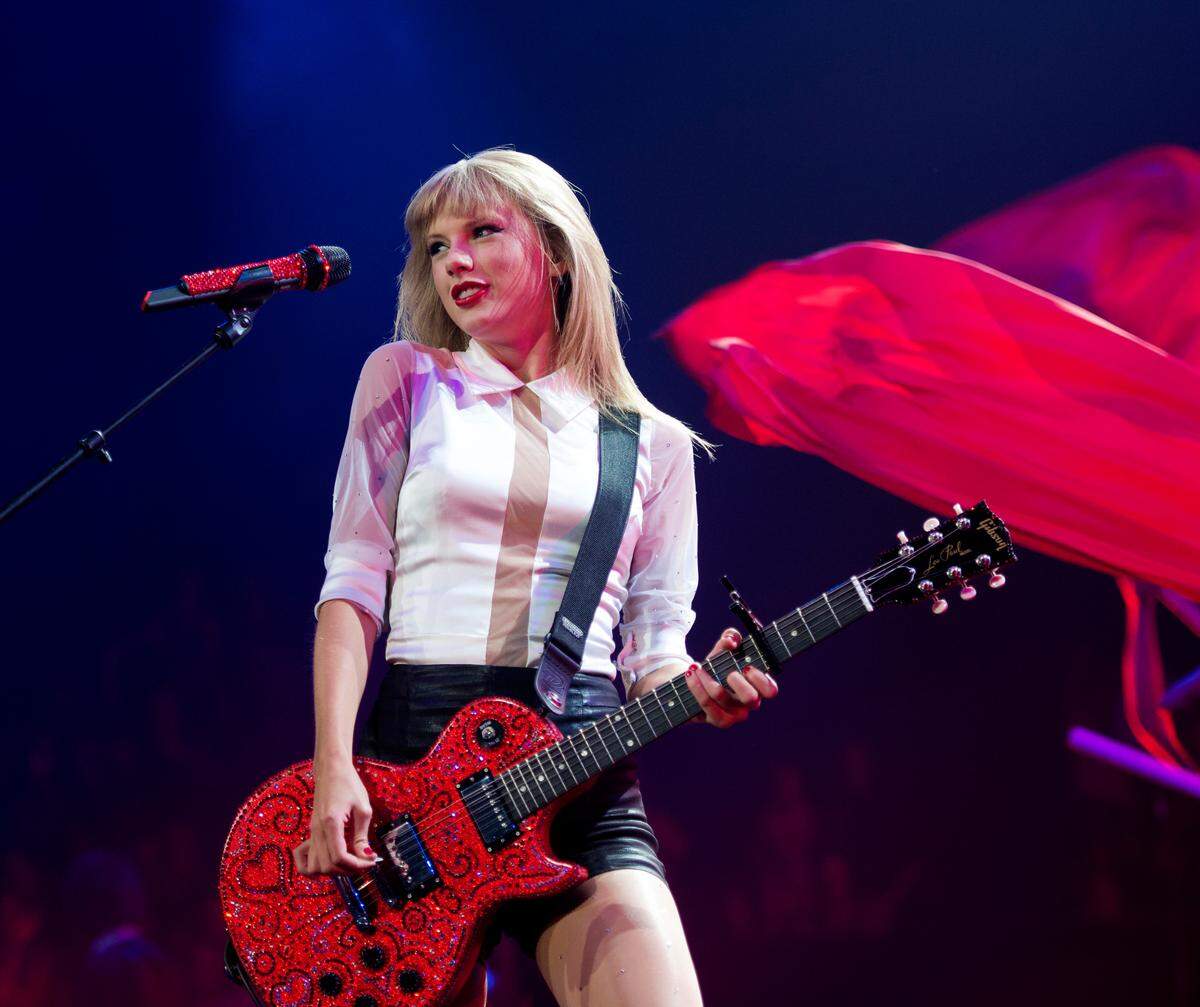 Taylor Swift had another red guitar for night one of her two Red Tour shows she performed in August of 2013 at Sprint Center.