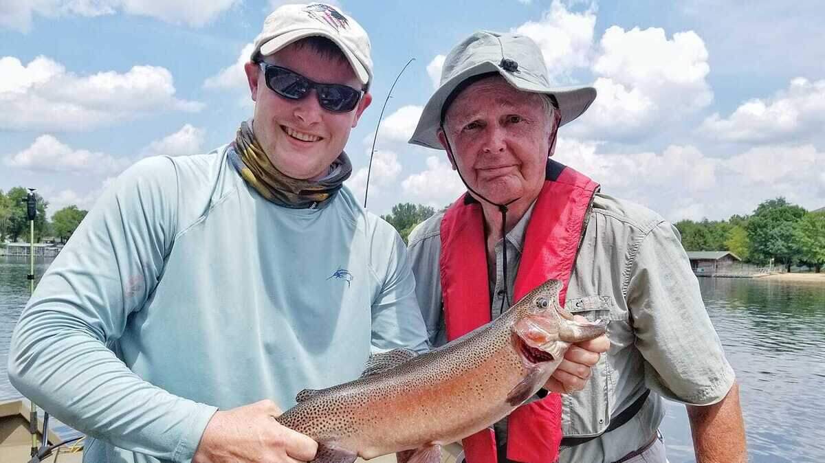 George Hays (right), 86, with grandson Payden Hays, recently went out on George’s first trout-fishing trip. George’s second fish of the day was this giant 23 1/2-inch, 3 pound, 13 ounce rainbow at Lake Taneycomo.