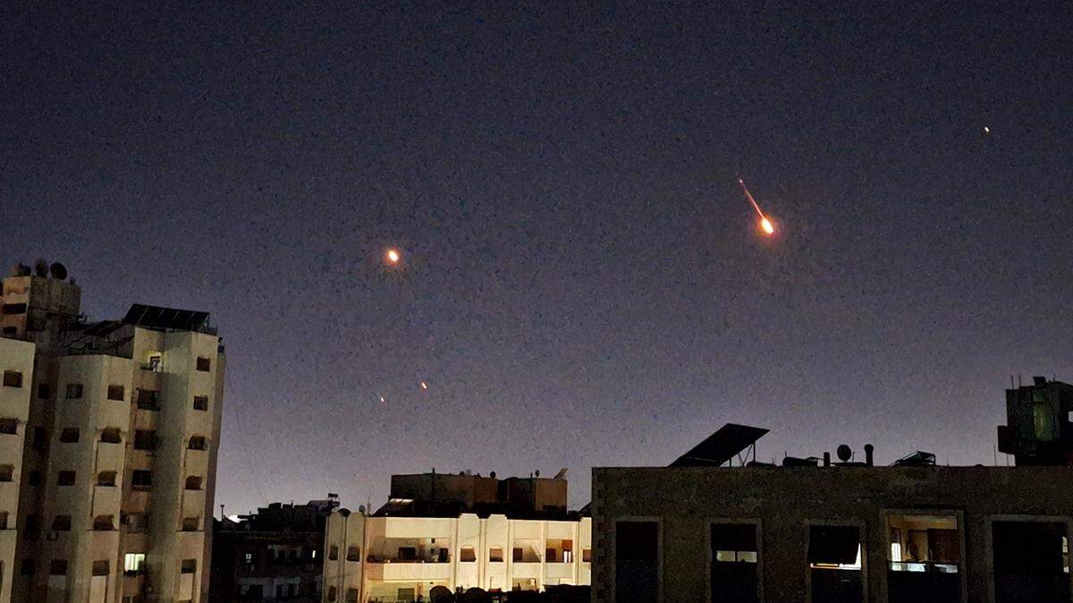 Traces of Iranian missiles heading toward Israel are seen over Damascus, Syria, on June 17.