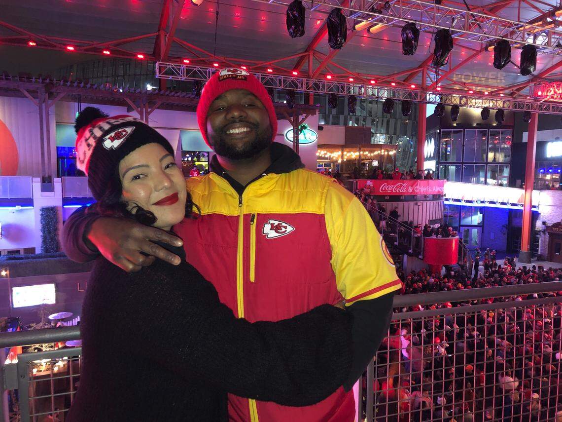 Katina Davis, 30, and her husband, Doninique Davis, 32, of Kansas City, celebrate at KC Live! after the Chiefs clinched the AFC championship title Sunday.