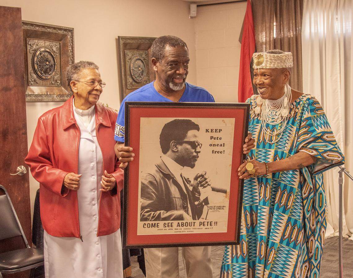 Charlotte O'Neal was presented a portrait of her husband Pet O'Neal, by Kansas City community members.