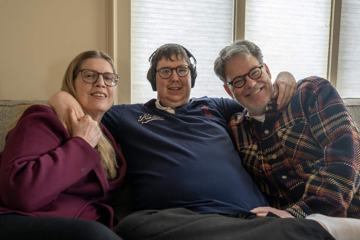 Shana Long, left, Harrison Long and Berry Long sit for a portrait at their home on Tuesday, Feb. 10, 2026, in Parkville.